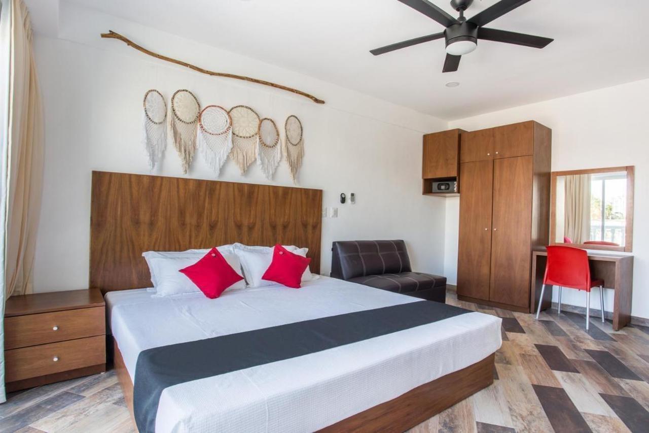 Capital O Cancun Ocean View, Cancún Extérieur photo A bedroom at the hotel