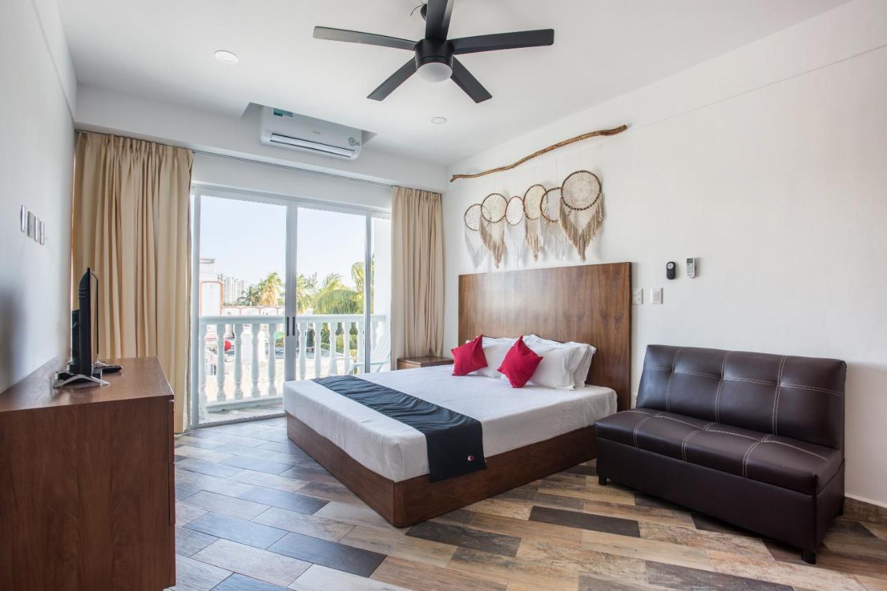 Capital O Cancun Ocean View, Cancún Extérieur photo A typical room at the hotel